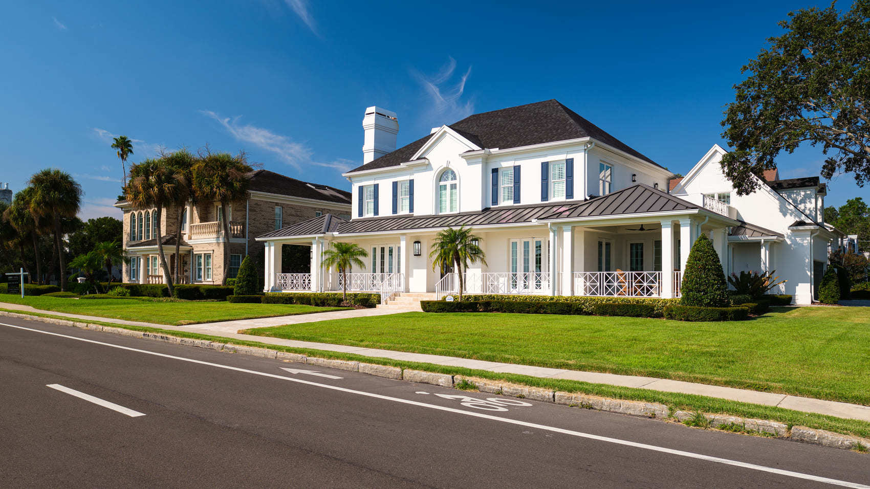 A stunning white home from the street in Tampa, Florida.